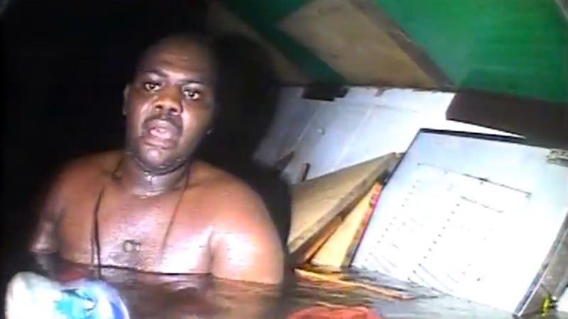 Okene Harrison, the Jascon 4 shipwreck's sole survivor, when rescue divers first discovered him. The tugboat capsized on May 26, 2013 off the coast of Nigeria and video of the rescue was released on Monday.