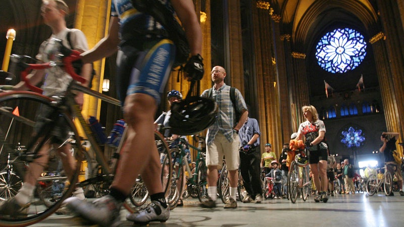 Cyclists inside the Cathedral of St. John the Divine in New York for the fifth annual Blessing of the Bicycles.