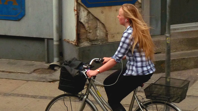 Long hair, don't care? Think twice before you let it flow free on your morning bike ride.