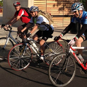 Members of the United States Navy participate in Bike to Work Day 2013.