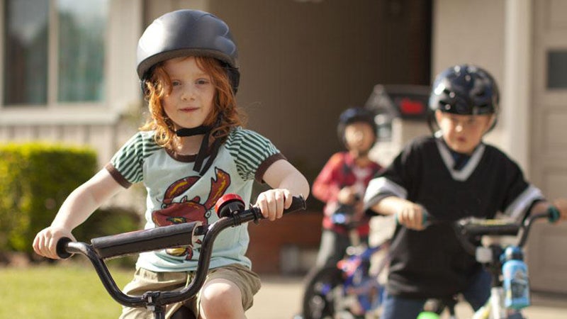 Who wants to learn to ride a bike in the driveway when you can do it alongside the Seine?