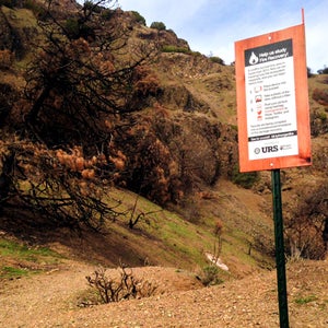Nerds for Nature placed this sign on Mt. Diablo's Summit trail. Anyone who passes by can take a photo of a specific spot, then post it to social media with the hashtag #morganfire04.
