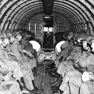 WWII paratroopers ready for drop.