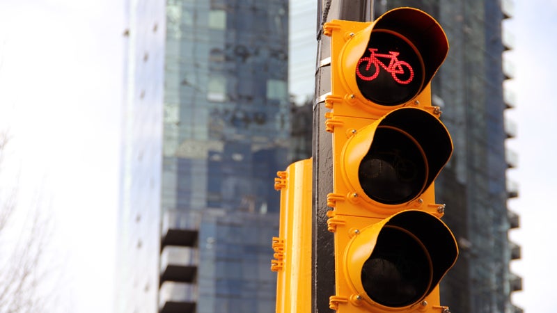 Local laws give potential safer bike plans the red light.