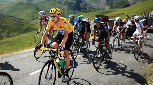 Bradley Wiggins rides in the 2012 Tour de France, where he took first place.