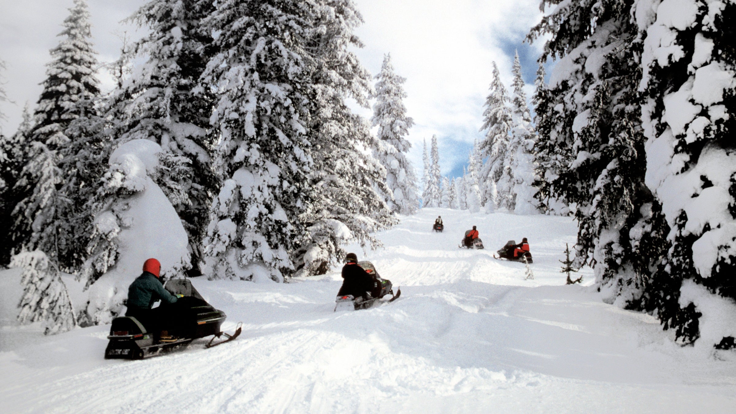 yellowstone snowmobiles outside winter