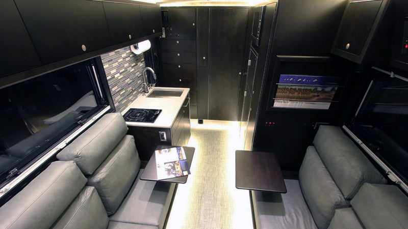 OutsideOnline shelter EarthRoamer XV-LT Lamborghini off-road campers car camping Ritz-Carlton $280 000 vehicle RV truck hotel merged chassis heavy-duty luxury stainless-steel solar-panel array heating air condition king-size bed interior couch
