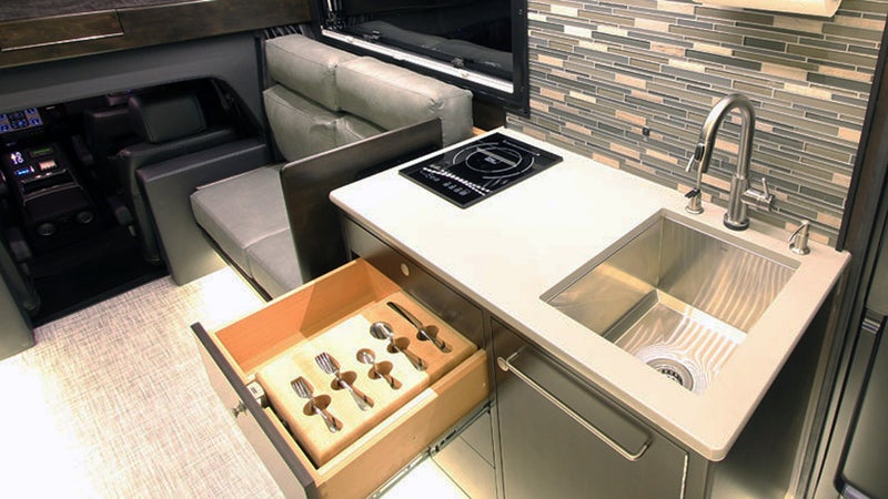 OutsideOnline shelter EarthRoamer XV-LT Lamborghini off-road campers car camping Ritz-Carlton $280 000 vehicle RV truck hotel merged chassis heavy-duty luxury stainless-steel solar-panel array heating air condition king-size bed interior kitchen utencils drawer stove sink