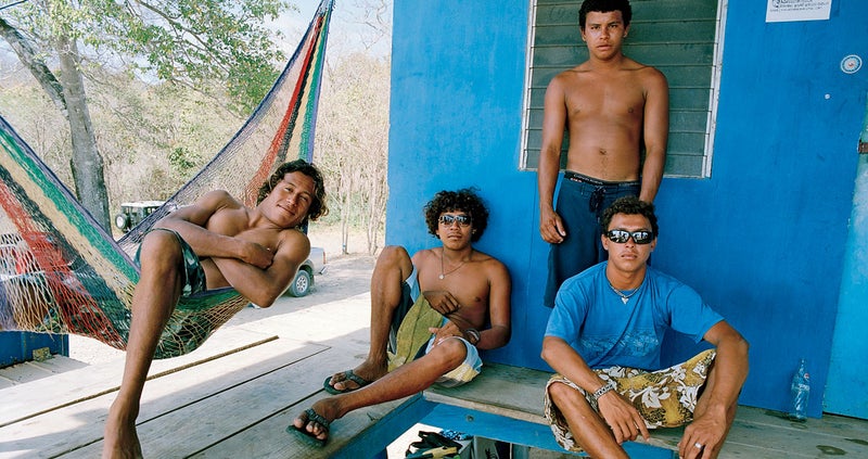 Surfers Samir Guillermo Duarte, Enrique Cascante, Mancel Cascante, and Oswaldo Bonilla at Playa Madera