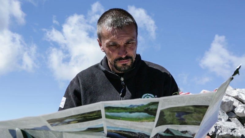 Kenan Muftić, Via Dinarica’s project manager during the mapping stage of the route last year, ponders the next move in Bosnia and Herzegovina's Sutjeska National Park on the trail's virgin run.