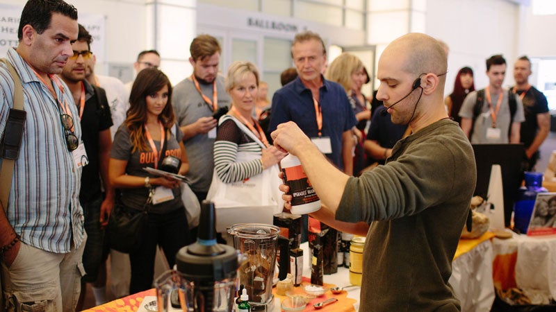 Demonstrating a Bulletproof concoction with the company's Upgraded Brain Octane Oil.