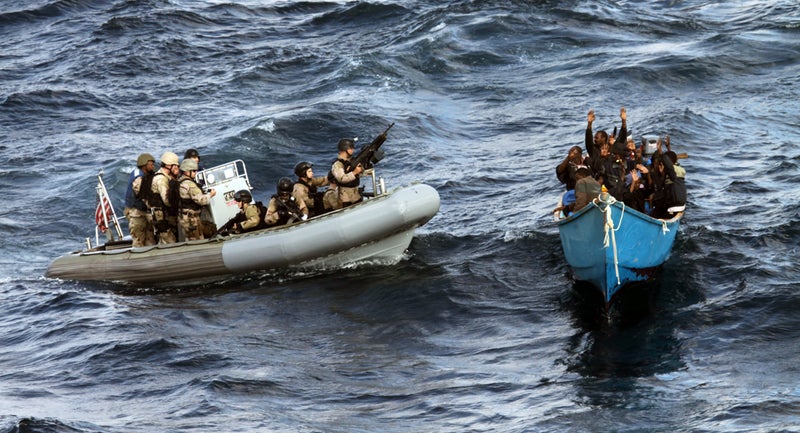 U.S. forces approach a suspected pirate vessel in the Gulf of Aden in December 2011.