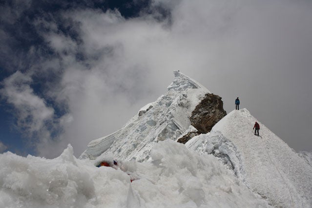 Summiting climbers