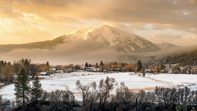 Colorado Mountains breaking storm carbondale clouds mount sopris snow sunrise outsize magazine best towns 2013 carbondale colorado