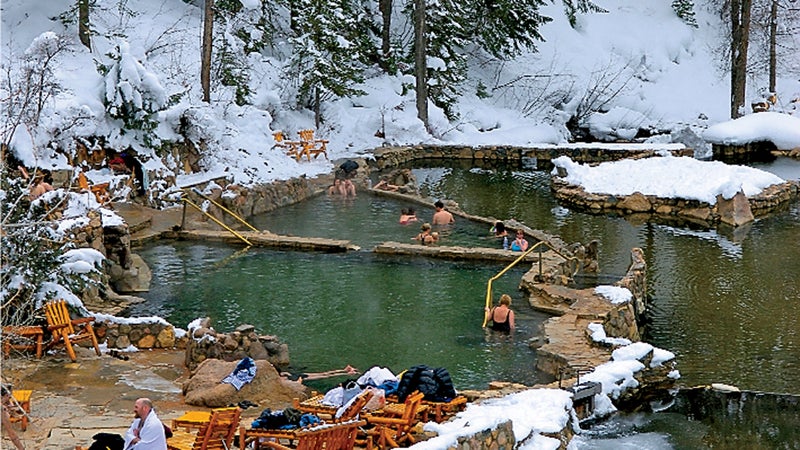 bathing Colorado color image Creek day Forest hot springs hot water Lifestyle Medium Group of People mountain OutdoorCollection outdoors pool Relaxing snow Soaking spa Steamboat Springs Strawberry Park Strawberry Ranch Hot Springs sulfur springs USA Vertical water winter