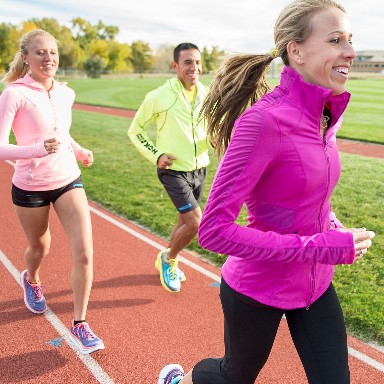 Jogging Concepts. Portrait of Professional Female Runner During Outdoor  Training. Running on Track and Equipped in Summer Training Outfit While  Running. Stock Photo