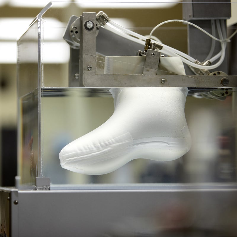 Boots Produced Per Year: 500,000
In 1965, company founder William Sweasy brought the European-style hiking boot designs he'd seen in the Alps to the U.S. and began creating his own line. The first boot was called the Voyageur—as was the company until it was renamed after Colorado’s Fort Vasquez in 1971. Fifty years later, it takes Vasque about four hours to produce a completed boot in its Asian factories. “Most of the of the boot-making process is done in one large factory line, but the Gore-Tex bootie where we create the 3-D sock that fits inside the boot is made in a different temperature-controlled room,” says Vasque’s Director of Product Development Brian Hall.
There, each bootie is inflated and dunked in water to test for leaks. “If you have the tiniest prick in the membrane, water will start coming in and you will know immediately,” says Hall. Defects, however, are rare. “Having watched the dunk tank process over the last 10 years, it is very rare to see a failure,” says Hall.
From $129, vasque.com